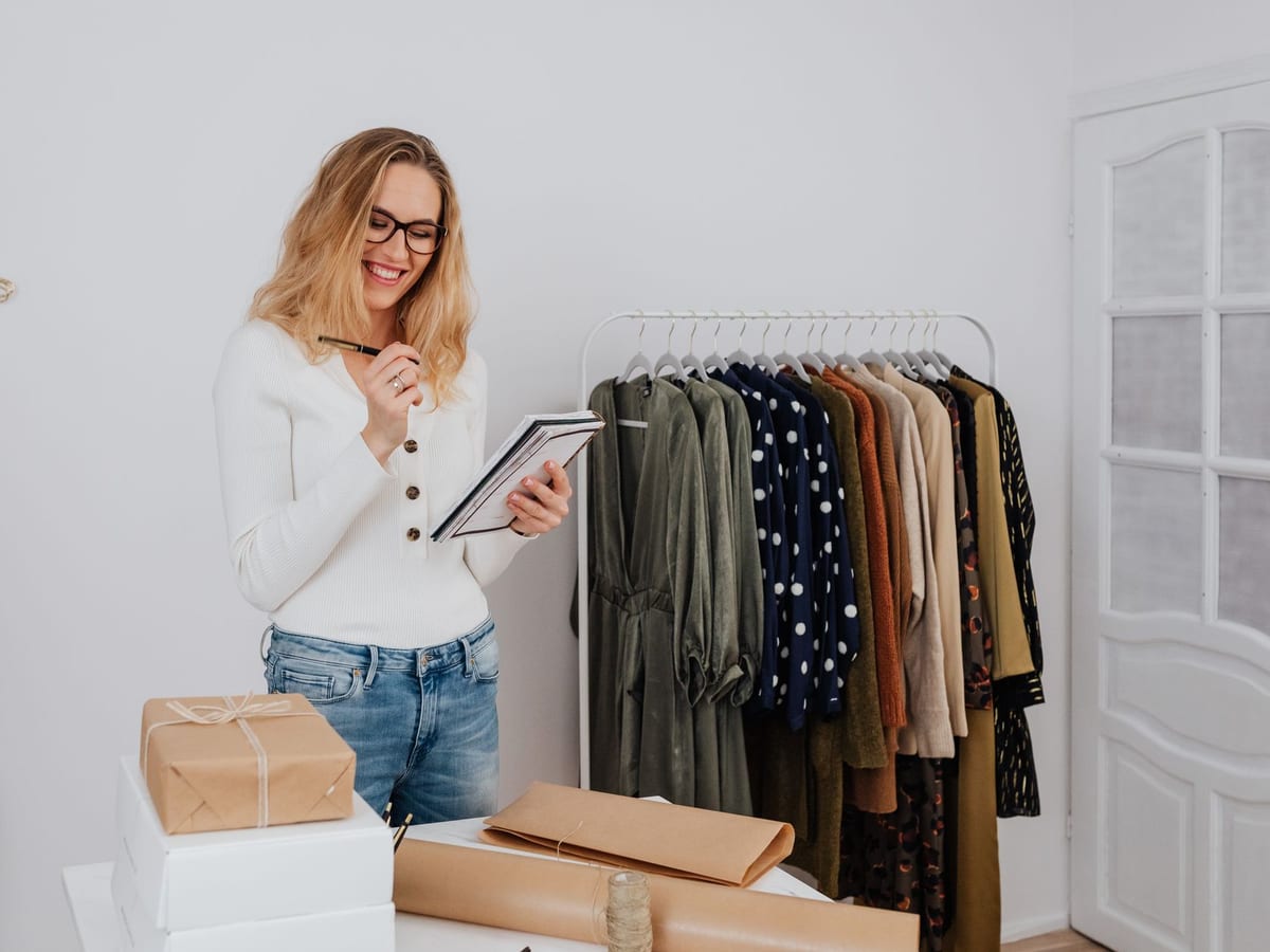 A small clothing business owner working with stock
